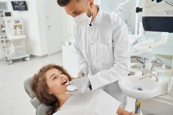 Dentist reviewing treatment options with a patient