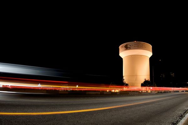 Haltom City water tower lit up at night