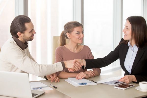 Business owners shaking hands on an agreement